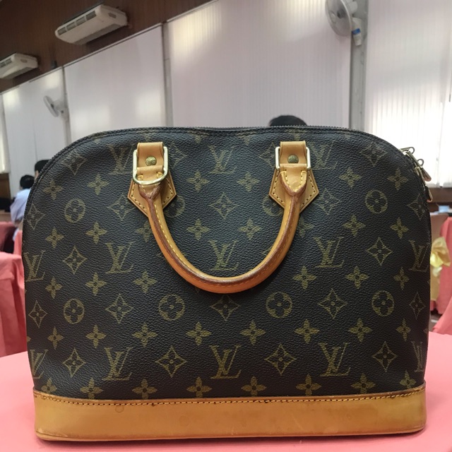 louis vuitton alma used