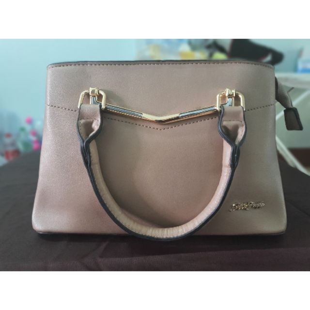 กระเป๋าหนังยี่ห้อ Taywin