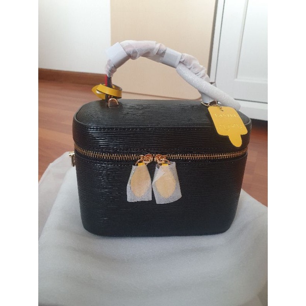 มือ1กระเป๋าlastelลายไม้สีดำ