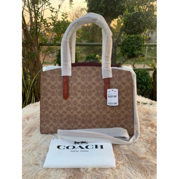 Coach Charlie Carryall In Signature Canvas