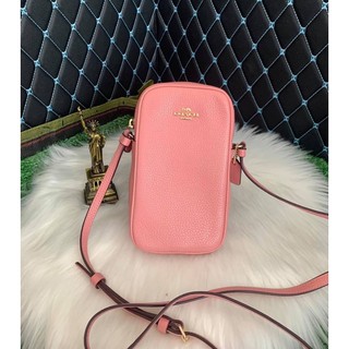 (ผ่อน0%) กระเป๋าใส่มือถือ สะพายข้าง NORTH/SOUTH ZIP CROSSBODY (COACH C0736) สี IM/LIGHT BLUSH หนังแท้ สีชมพู