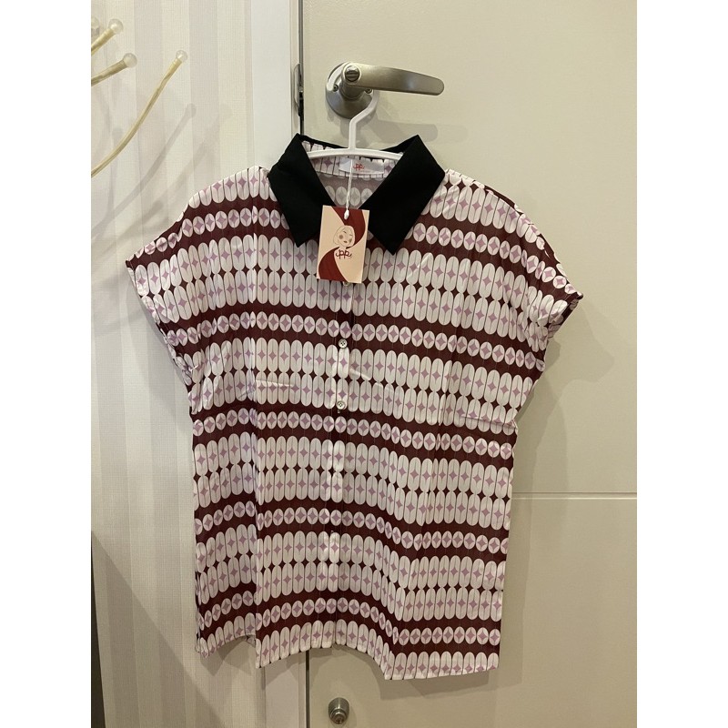 เสื้อแขนตัด Poi fashion