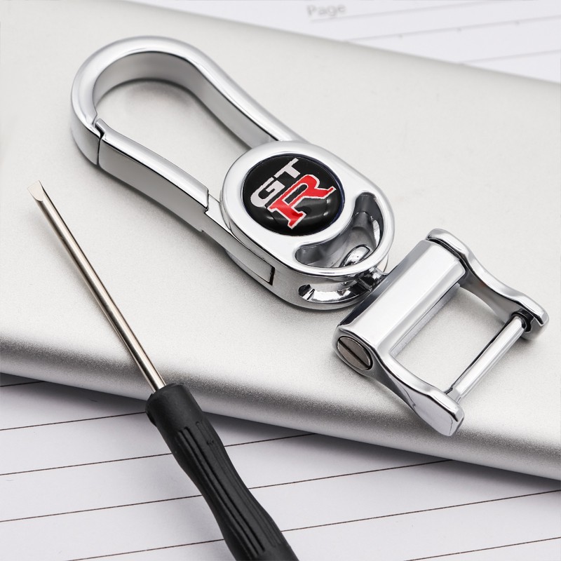 พวงกุญแจรถโลหะโลโก้รถบุคลิกภาพคาราบิเนอร์ที่เรียบง่ายเหมาะสําหรับ Nissan- GTR R32 R35 R34