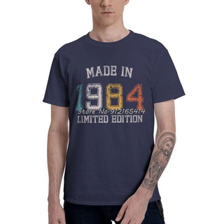 เสื้อยืดคอกลม แขนสั้น ผ้าฝ้าย พิมพ์ลาย Made in 1984 สไตล์ฮาราจูกุ สําหรับผู้ชาย คู่รัก เหมาะกับการเกิด 1984