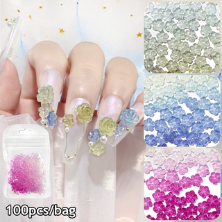 อัญมณีคริสตัล รูปโบว์ ดอกไม้ 3D เปลี่ยนสีได้ สําหรับตกแต่งเล็บ DIY 100 ชิ้น ต่อถุง
