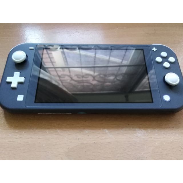 Nintendo switch lite สีดำ มือสอง แถม MICRO SD CARD 128 GB (ไม่มีกล่อง)