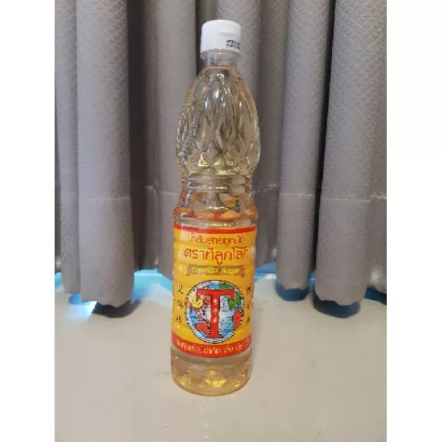 น้ำส้มสายชูหมัก ง่วนเชียง ตราทีลูกโลก (ทำจากธรรมชาติ 100%) 700 ml PURE RICE VINEGAR