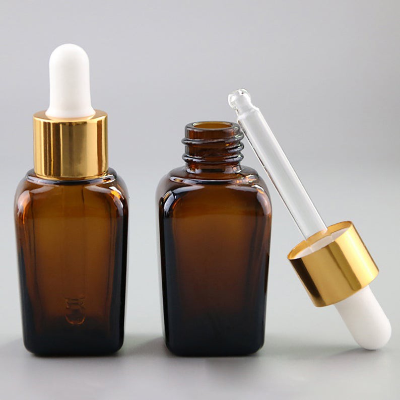 ขวดบรรจุภัณฑ์เครื่องสำอางสำหรับบรรจุ 20ml  ขวดแก้วดรอปเปอร์สีชาสำหรับบรรจุเซรั่มใส่สารสกัดของเหลว cosmetics packaging glass bottle