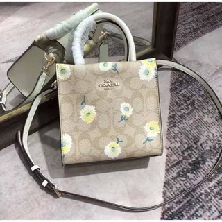 COACH MINI CALLY CROSSBODY IN SIGNATURE CANVAS WITH DAISY PRINT (COACH C3599)