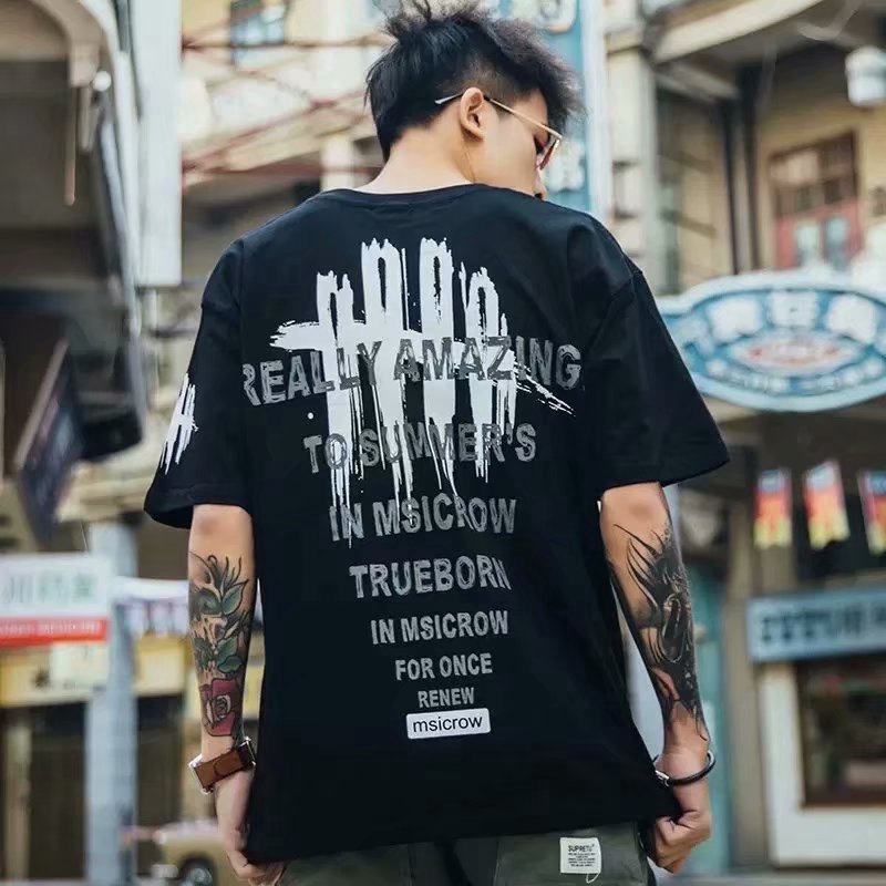 เสื้อยืดผ้าฝ้าย แขนสั้น สีพื้น พิมพ์ลาย ทรงหลวม สไตล์ฮิปฮอป แฟชั่นฤดูร้อน สำหรับผู้ชายและผู้หญิง S-8XL