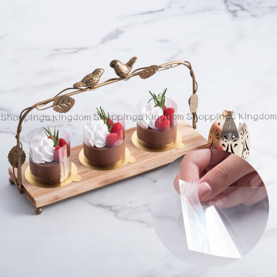 พลาสติกแข็งพันชิ้นมูส พลาสติกใส พลาสติกพันเค้กมีเทปกาว ขนาด 6*23.5 Cm.