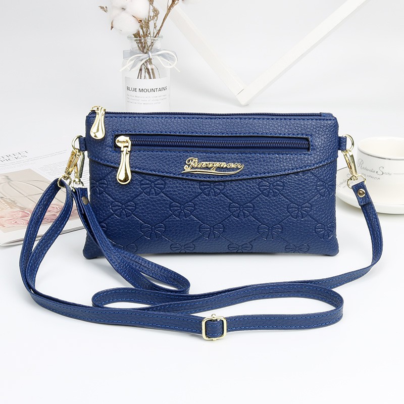 ใหม่ กระเป๋าคลัทช์ กระเป๋าใส่เหรียญ ขนาดเล็ก ลายลิ้นจี่ แบบนูน แฟชั่นสําหรับสตรี 2021