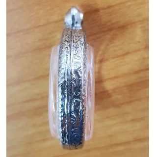 กรอบพระแสตนเลสแบบวงกลม หน้าแกะลายไทย แถมฟรี ! ห่วงแสตนเลส และแผ่นโฟม