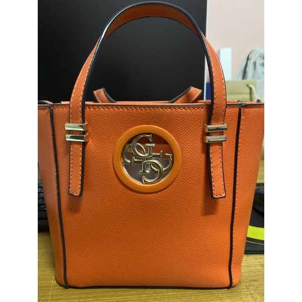 กระเป๋าถือสุภาพสตรี ยี่ห้อ GUSS สีส้ม สภาพดีมือ2 ของแม่ค้า