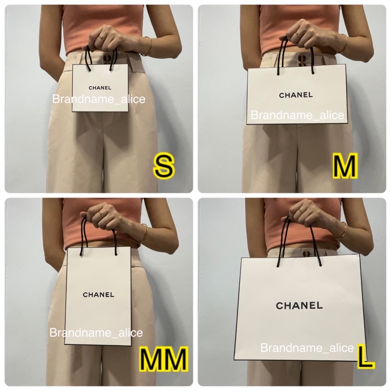 แท้ ถุงกระดาษ Chanel สีขาว สายสีดำ แพคใส่กล่องอย่างดีค่ะ
