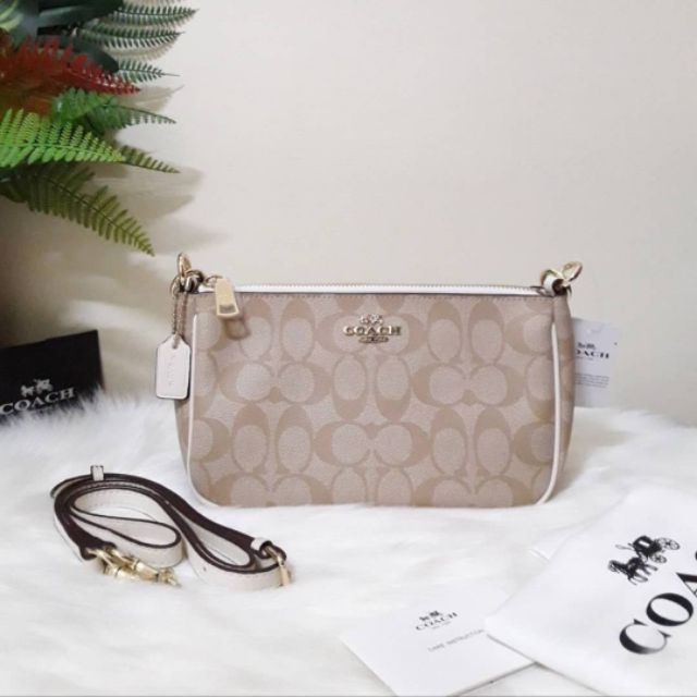 COACH TOP HANDLE POUCH IN SIGNATURE