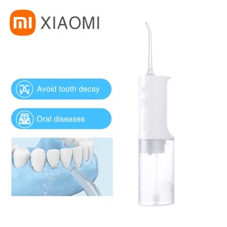 XIAOMI MIJIA Mi oral irrigator แบบพกพาทำความสะอาดฟัน IPX7 กันน้ำน้ำ Pick ฟันน้ำไหมขัดฟันสี่ชนิดหัวฉีด SK10060