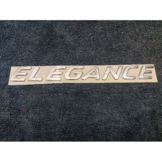 โลโก้ ELEGANCE    ติดรถ MAZDA