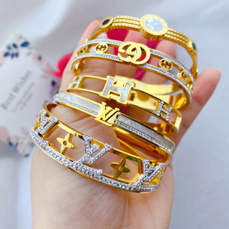 สร้อยข้อมือ เหล็กไทเทเนียม ชุบทอง 18K จี้ตัวอักษร G คู่ สวยหรู แฟชั่นเกาหลี ของขวัญวันหยุด