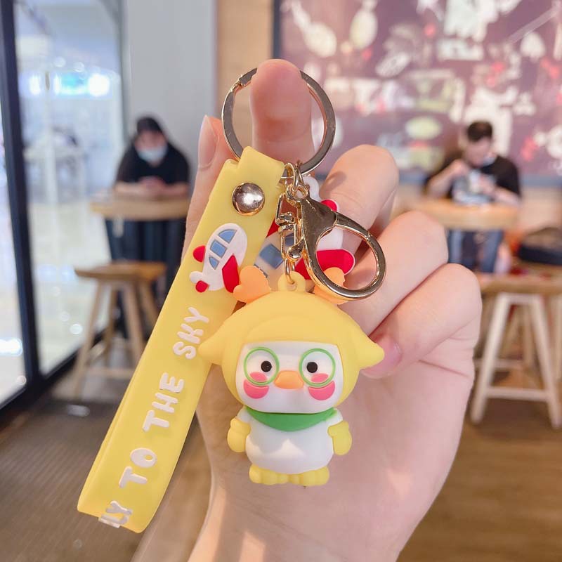 พวงกุญแจ จี้การ์ตูนเป็ดน่ารัก ขนาดเล็ก เหมาะกับของขวัญ สําหรับกระเป๋านักเรียน - รูปที่ 7