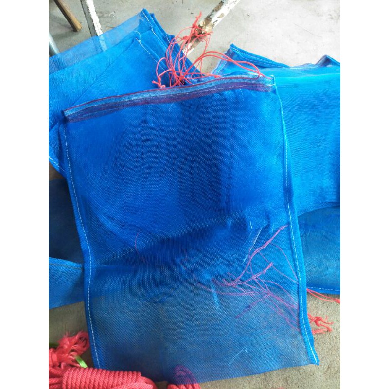 ถุงผ้าแยงใส่ปลาแบบผ้าเขียว เญ้บขอบให้เรียบร้อย