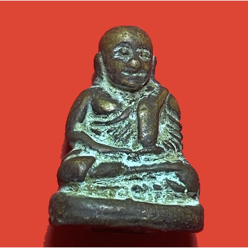 Luang Pu Ngern Wat Bang Klarn amulet coin, a traditional Thai lucky charm believed to bring fortune and protection