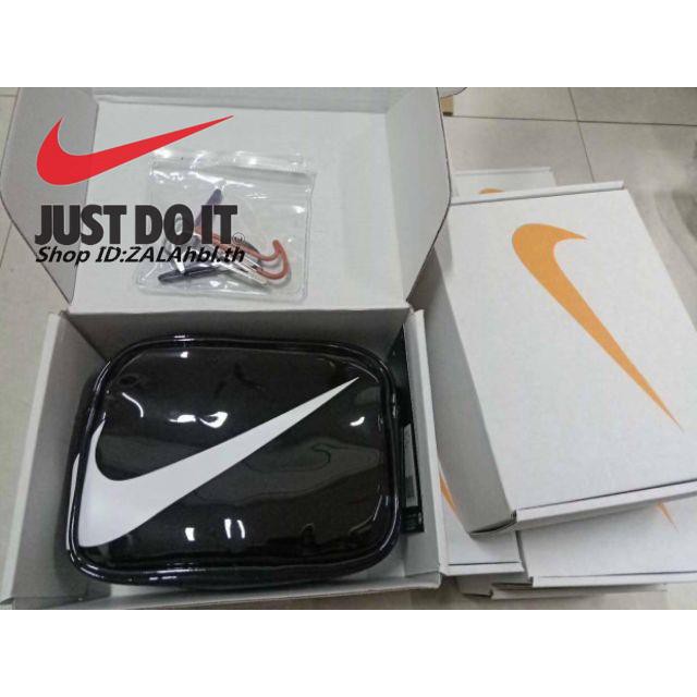 nike mini swoosh pvc sling bag