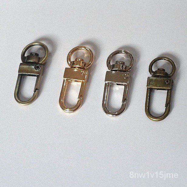 ตะขอ คอหมา สูง 3.3 cm.สำหรับสายกว้าง 1 cm. คู่ละ ujeM