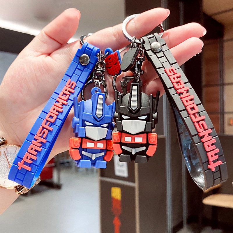 พวงกุญแจ จี้การ์ตูน Transformers Autobot Optimus Prime เหมาะกับของขวัญปาร์ตี้ ของเล่นสําหรับเด็ก