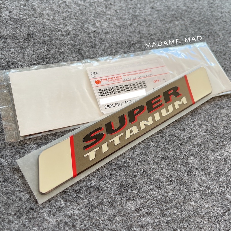 แท้ศูนย์ % โลโก้ SUPER TITANIUM ขนาด 18x2.6cm (ACN-5-86702311-0)