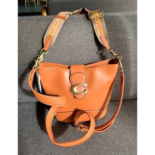 COACH TAIL BUCKET BAG