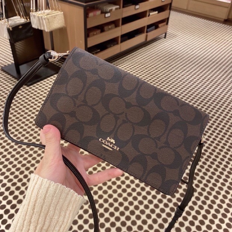 3,990 ANNA FOLDOVER CROSSBODY CLUTCH IN SIGNATURE CANVAS (COACH 3036