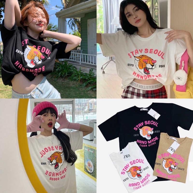 🌟st.f_shop🌟 เสื้อยืด แขนสั้น คอกลม งานคอป้ายŹÀRA ลายน้องเสือ STAY SEOUL ตาหัวใจมี 3 สี ดำ ขาว ครีม f
