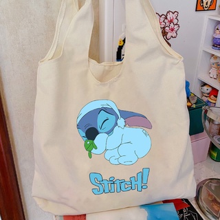 กระเป๋าสะพายไหล่ กระเป๋าถือ ผ้าแคนวาส ลายการ์ตูน Stitch ขนาดใหญ่ จุของได้เยอะ สําหรับสตรี