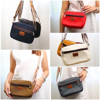 กระเป๋า Crossbody ผ้าแคนวาส กันน้ำ สายปรับระดับได้ มี 7 สี