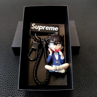 (Keychain) โคนันนักสืบพวงกุญแจตุ๊กตาโมเดลอุปกรณ์ต่อพ่วงคุโด้ชินอิจิกระเป๋านักเรียนจี้พวงกุญแจรถของขวัญ