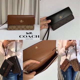 COACH 78229 FOLDOVER WRISTLET IN SIGNATURE CANVAS