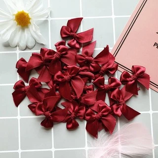 โบว์จิ๋ว แพ็คละ 100 ชิ้น ริบบิ้นหน้ากว้าง 12-13 มม. โบว์ผ้าซาตินอย่างดีสีพรีเมี่ยมเรียบหรู