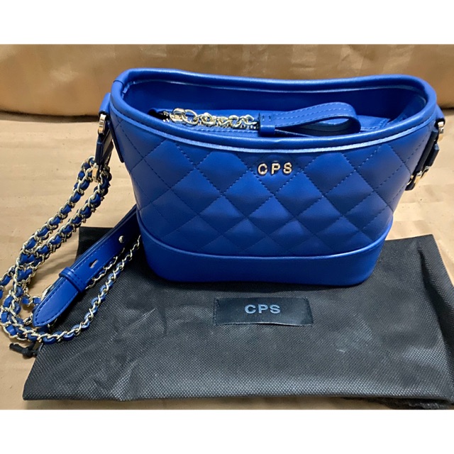 กระเป๋าสะพายสีน้ำเงิน cps