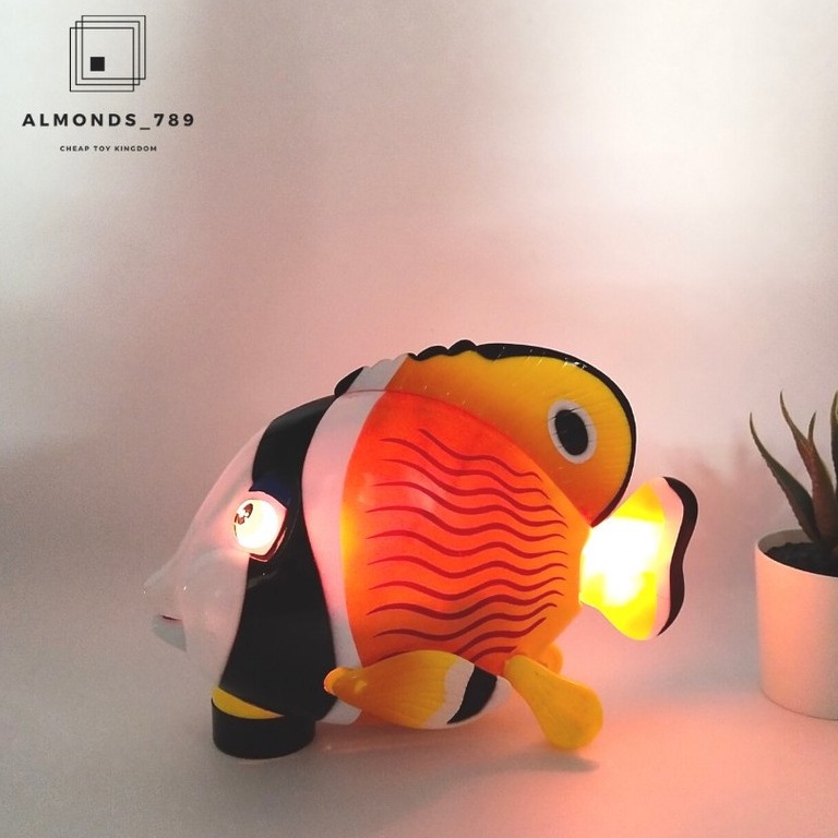 ปลาใส่ถ่าน LOVELY FISH ปลาว่ายน้ำล้อหมุนได้รอบทิศทาง มีไฟ มีเสียง สวยงาม ของเล่นเสริมพัฒนาการ คละลาย
