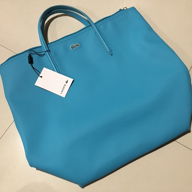 กระเป๋าถือ Lacoste ของแท้ สีฟ้า #มีโค้ดลด130บาท