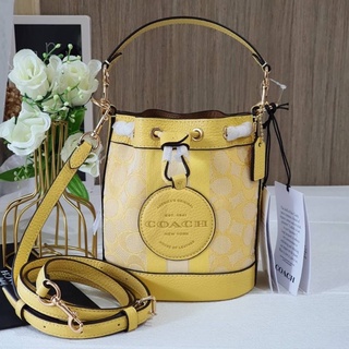 (ผ่อน0%)กระเป๋าสะพายข้าง COACH MINI DEMPSEY BUCKET BAG IN SIGNATURE JACQUARD WITH STRIPE C8322 มินิบัคเก็ต ลายซีสีเหลือง