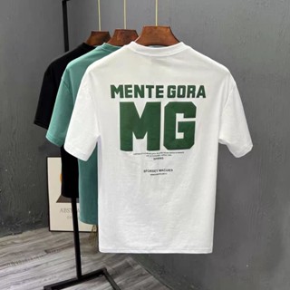 Mg เสื้อยืดแขนสั้นลําลอง ผ้าฝ้าย พิมพ์ลายตัวอักษร เข้ากับทุกการแต่งกาย แฟชั่นฤดูร้อน สําหรับผู้ชาย