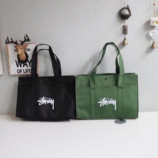 กระเป๋าผ้าแคนวาส สีเขียว Stussy magazine appendix tide brand Stussy green ผู้ชายและผู้หญิง tote กระเป๋าสะพายไหล่ กระเป๋าถือ เฉียง