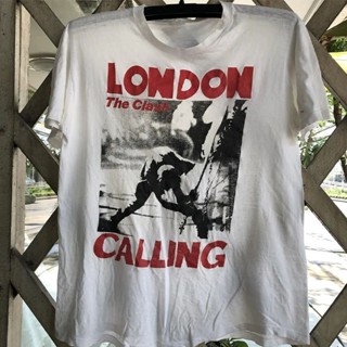 เสื้อยืดแขนสั้น พิมพ์ลาย The Clash Impact Band American Street Metal Rock Punk Cityboy T-shiThe Clash เหมาะกับสตรีทร็อค สไตล์พังก์ สําหรับผู้ชาย 8.9