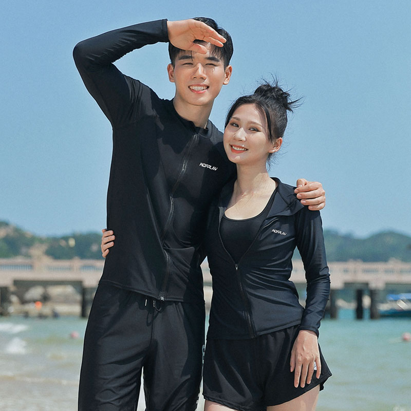 Wdfplay คู่รัก UV แขนยาว ผื่นผิว ป้องกันผื่น รัดรูป ชุดว่ายน้ํา ดําน้ํา เสื้อแจ็กเก็ตผู้ชาย แยกกางเกง แขนยาว กันแดด ชุดดําน้ํา แห้งเร็ว