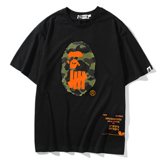 เสื้อยืด พิมพ์ลายจักรวาล Bape x Undefeated ไม่มีใครสูญเสียด้านหลัง