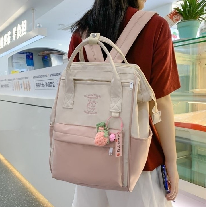 กระเป๋าเป้สะพายหลัง กระเป๋านักเรียน จุของได้เยอะ ลายโดนัท สีมาการอง สไตล์เกาหลี สําหรับผู้หญิง
