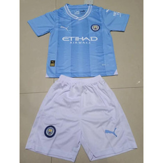 เสื้อกีฬาแขนสั้น ลายทีมชาติฟุตบอล Manchester City 2023/24 ชุดเหย้า สําหรับเด็ก