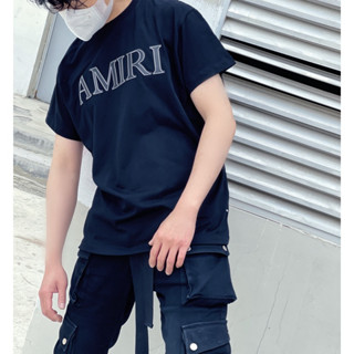 Amiri เสื้อยืดคอกลม แขนสั้น ผ้าฝ้าย พิมพ์ลายโลโก้ตัวอักษร สีดํา และสีขาว สไตล์อเมริกัน แฟชั่นสําหรับผู้ชาย และผู้หญิง